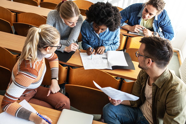 Young college students review classwork