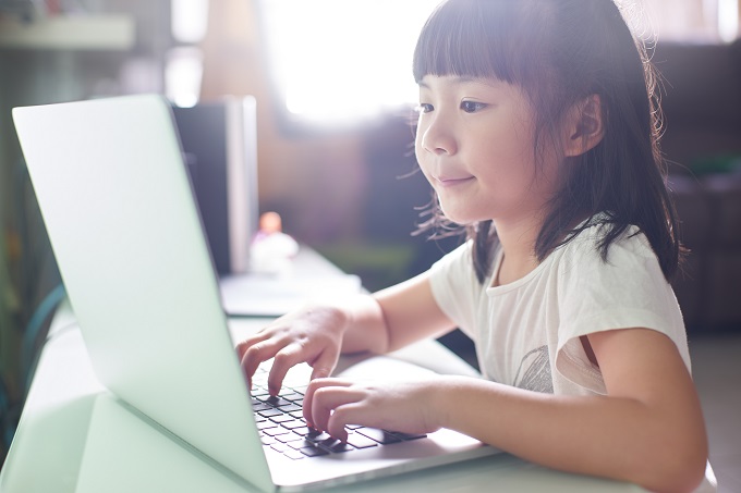Young girl at laptop